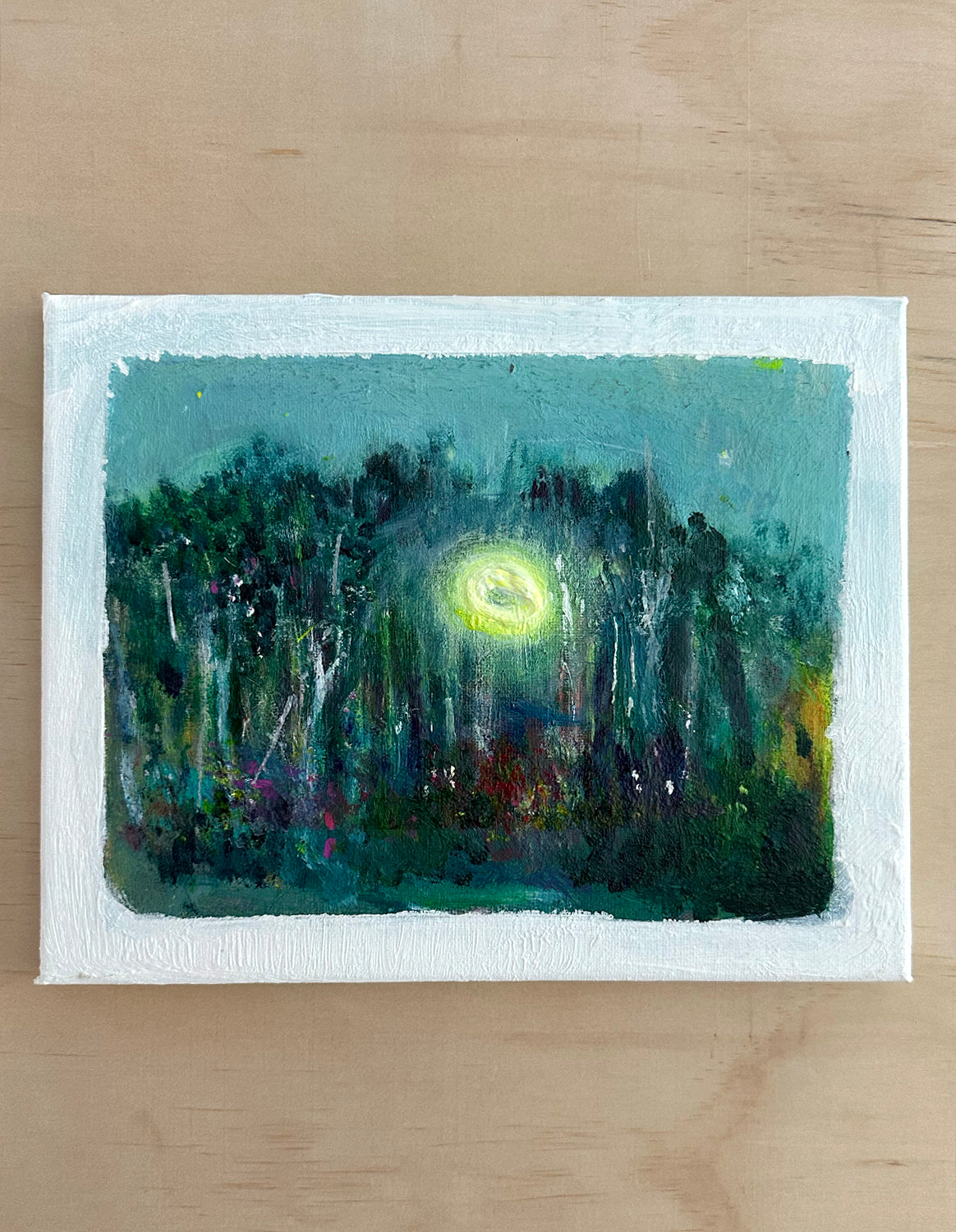Luci Avard, halo over trees