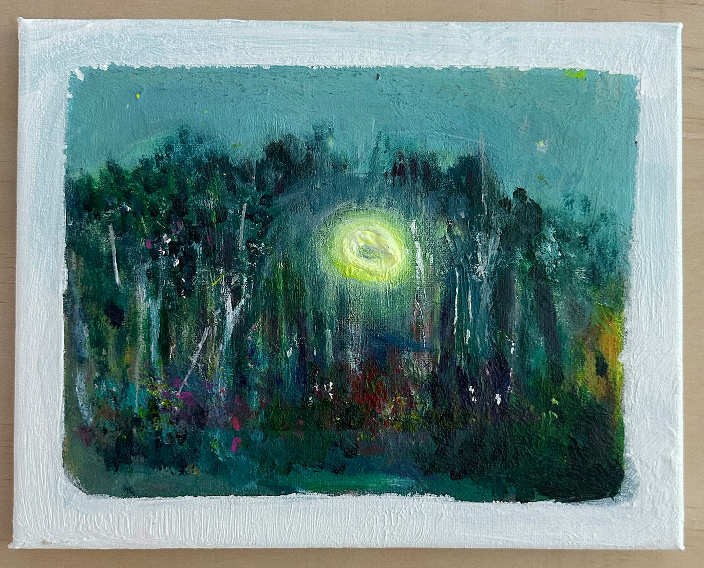 Luci Avard, halo over trees