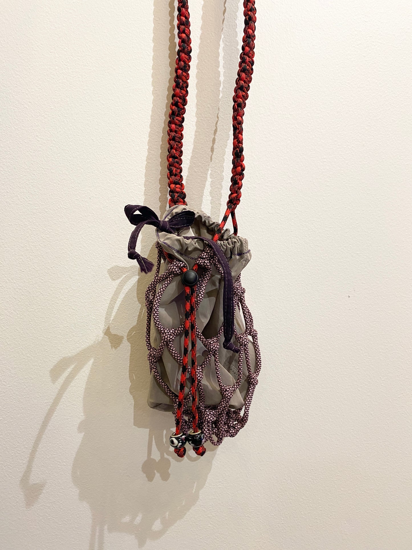 Amihan Aquilizan, bottle bag pink/red/black