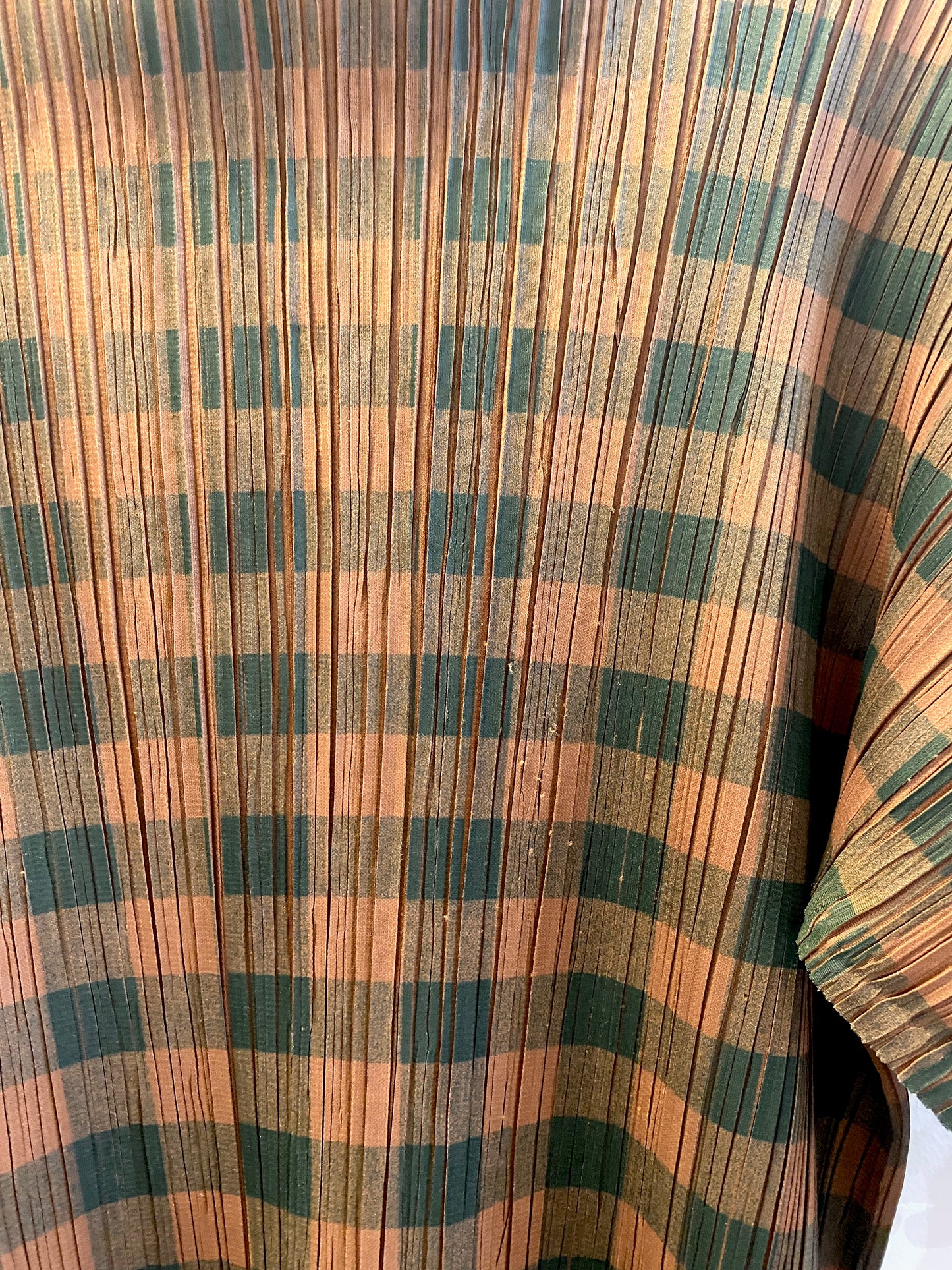 Gigi, Issey Miyake Pleats Please top