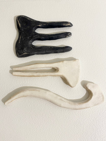 Three prong (dark), 2026