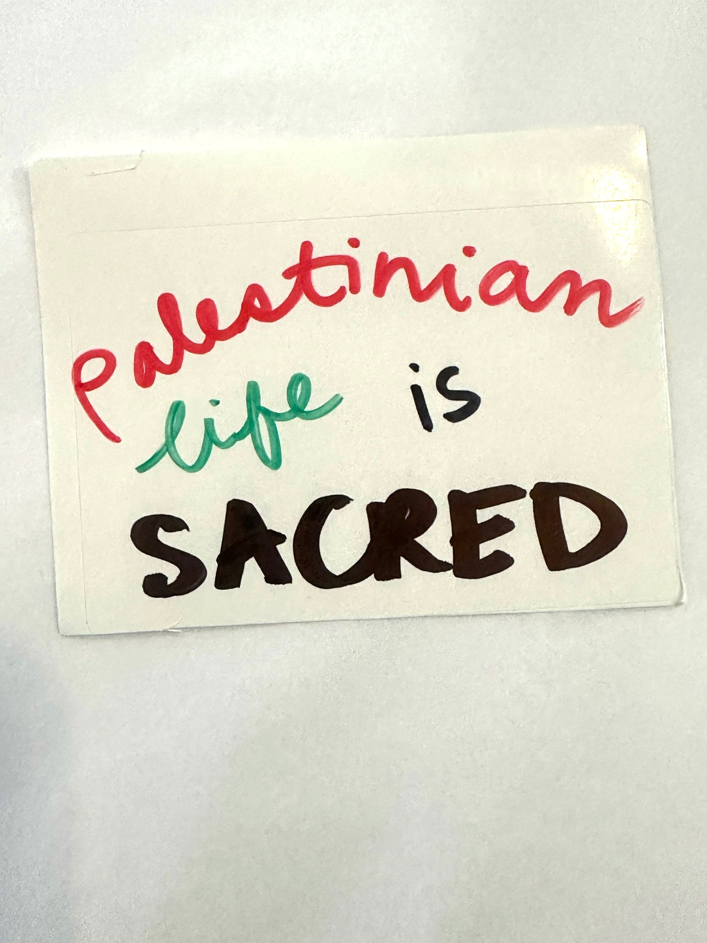 Nicole Barakat, crochet green and gold earrings