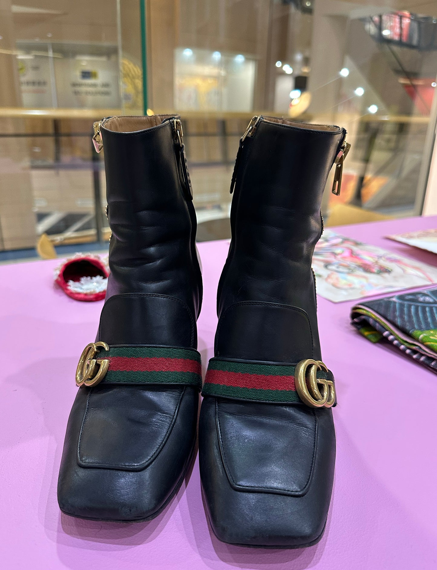 Treasure, Gucci boots