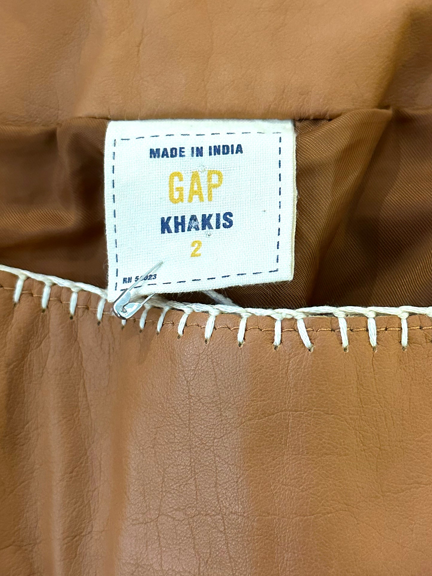 Mindy, Gap khakis leather skirt