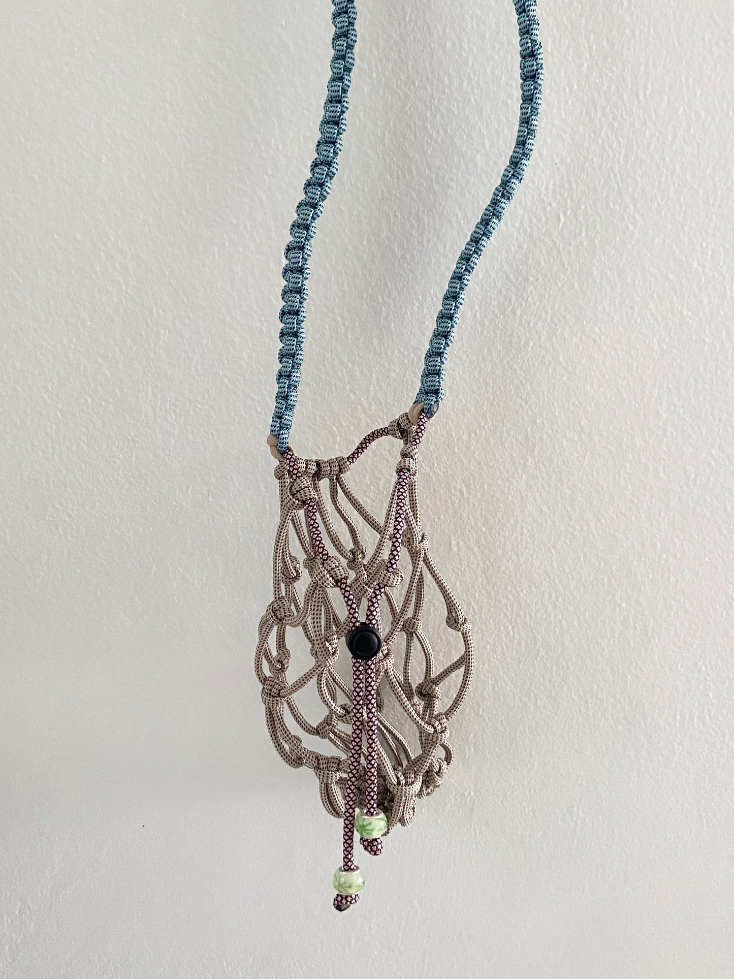 Amihan Aquilizan, bottle bag tan/blue/pink