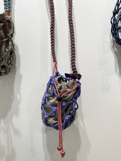 Amihan Aquilizan, bottle bag purple/pink/red