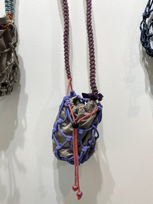 Amihan Aquilizan, bottle bag purple/pink/red