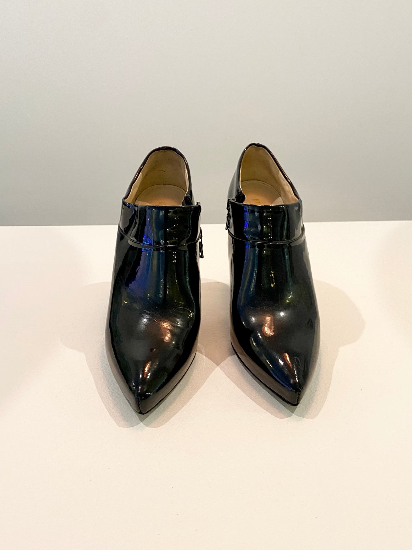 Treasure, Prada ankle boot heels