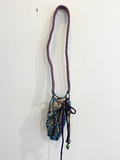Amihan Aquilizan, over the shoulder bottle bag blue/brown/purple