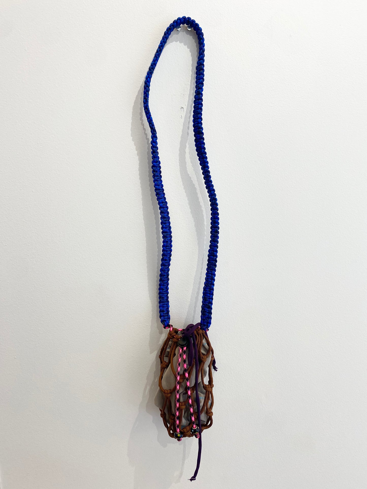Amihan Aquilizan, cross body bottle bag pink/brown/blue