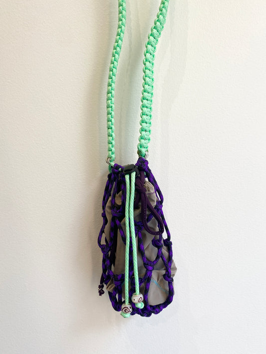 Amihan Aquilizan, cross body bottle bag purple/turquoise/black