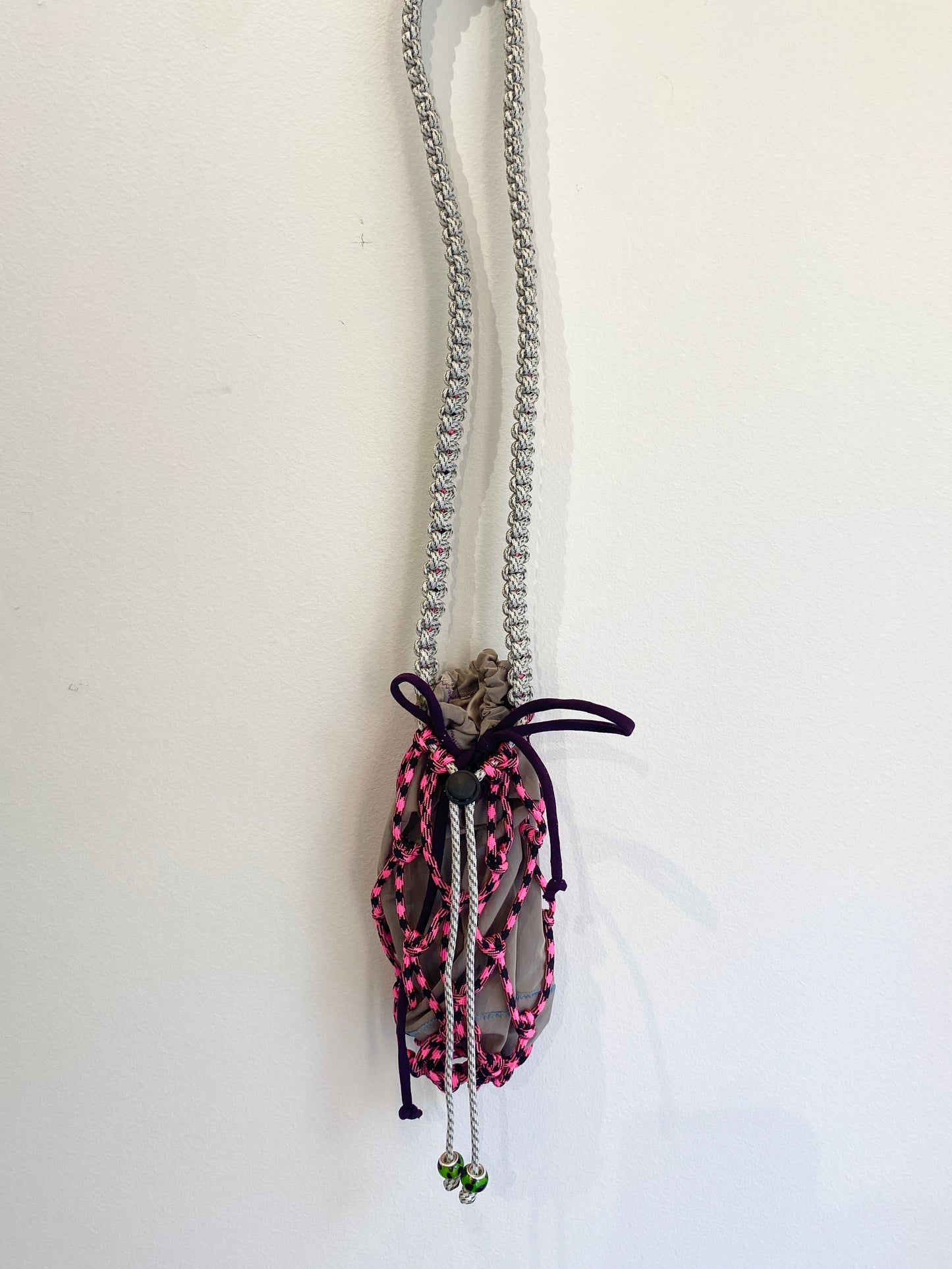 Amihan Aquilizan, over the shoulder bottle bag pink/grey/black