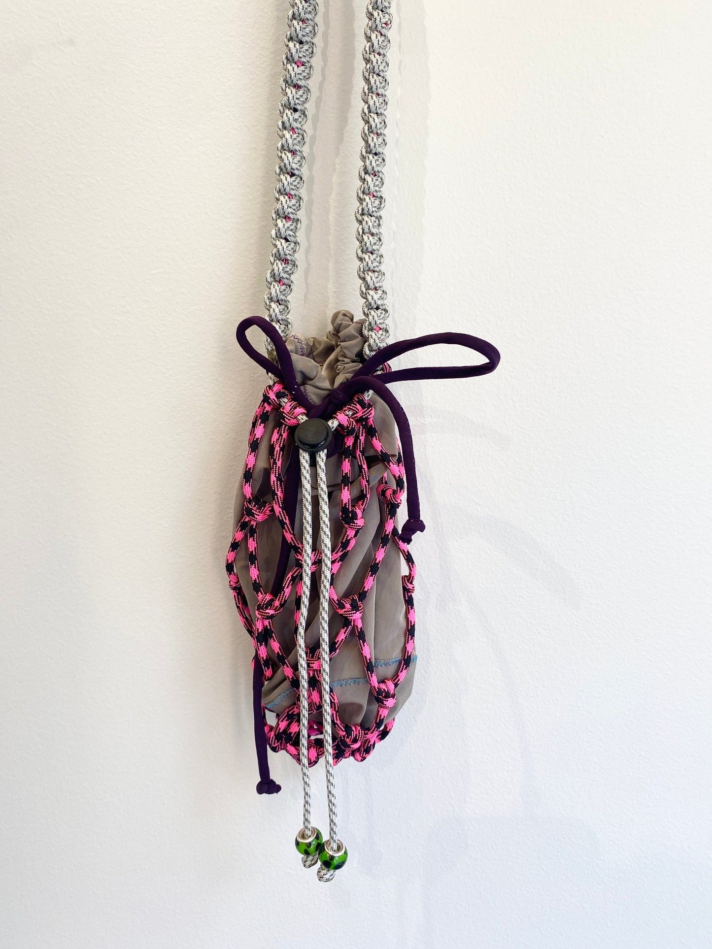 Amihan Aquilizan, over the shoulder bottle bag pink/grey/black