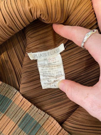 Gigi, Issey Miyake Pleats Please top