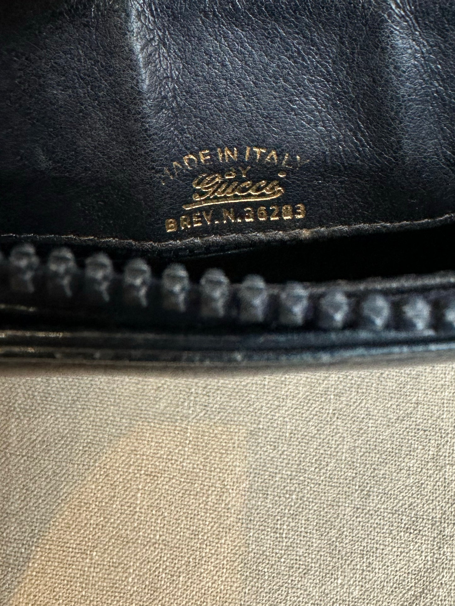 Viv, Gucci blue and gold handbag