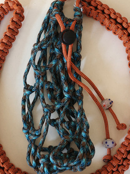 Amihan Aquilizan, cross body bottle bag orange/blue/grey