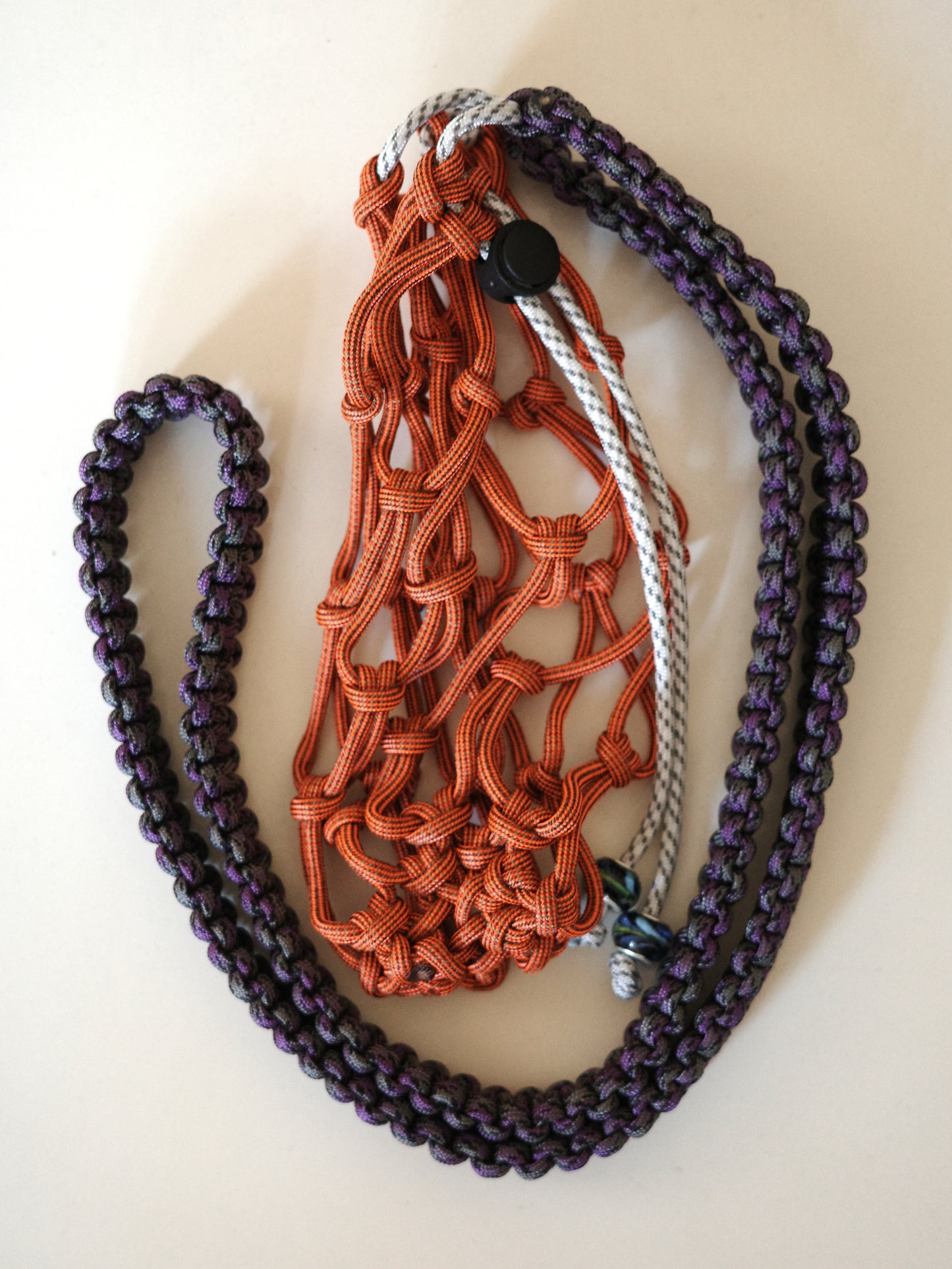 Amihan Aquilizan, cross body bottle bag orange/purple/grey