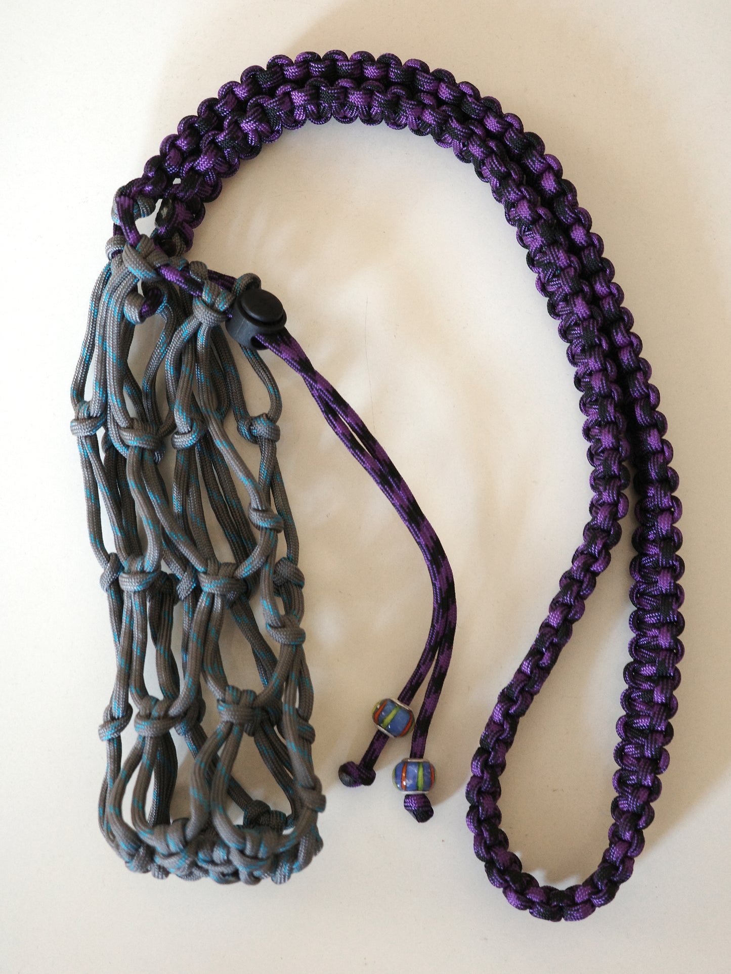 Amihan Aquilizan, over the shoulder bottle bag grey/turquoise/purple